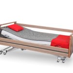 Łóżko rehabilitacyjne Darion w obudowie drewnianej